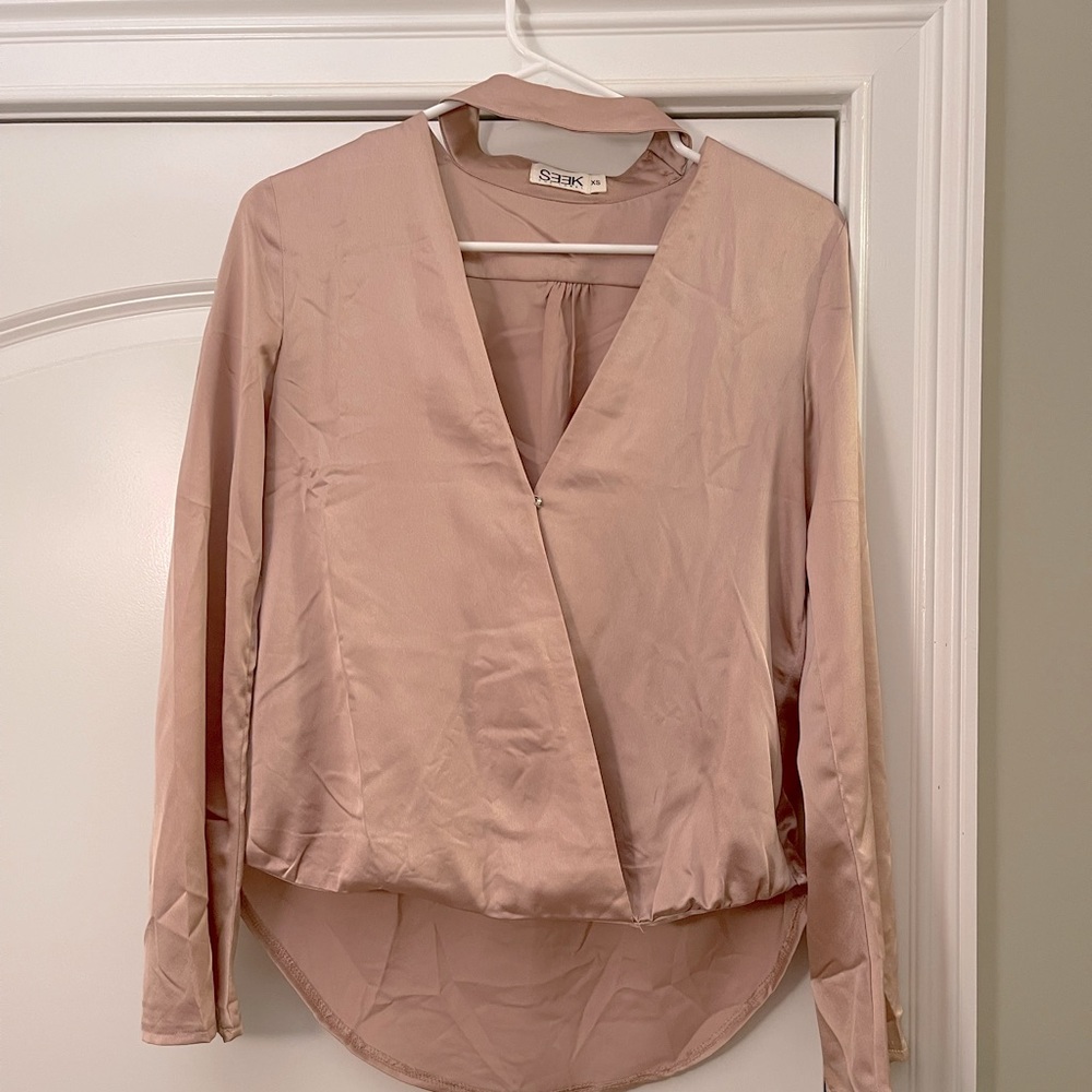 Beautiful Champagne colored blouse with choker detail!